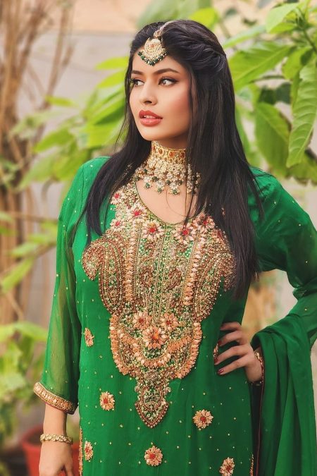 Image of a green shirt and maroon plazo embroidered dress, perfect for weddings and bridesmaids, showcasing intricate detailing and elegant design.