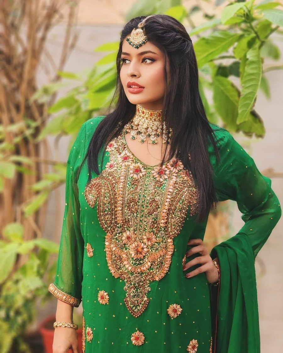 Image of a green shirt and maroon plazo embroidered dress, perfect for weddings and bridesmaids, showcasing intricate detailing and elegant design.