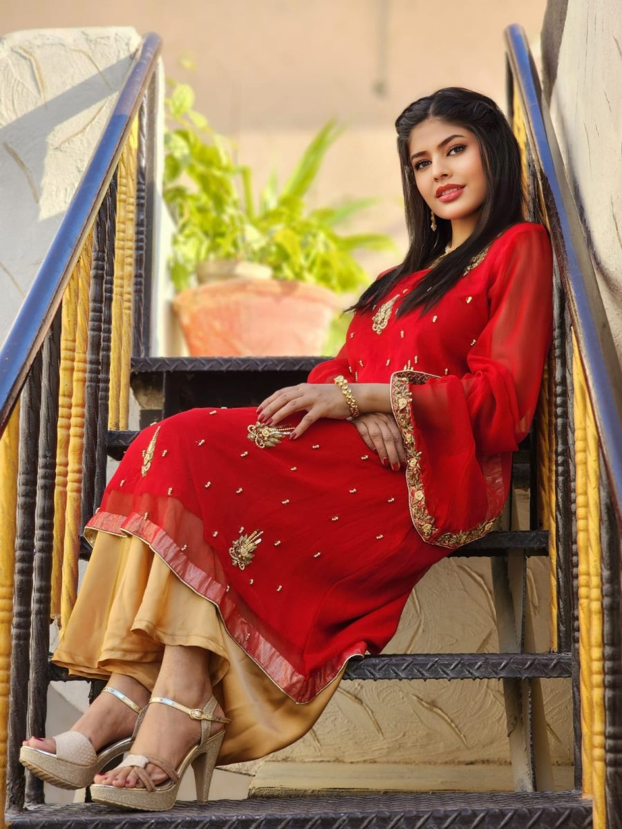 Red shirt and flapper dress with intricate embroidery, perfect for bridesmaids.